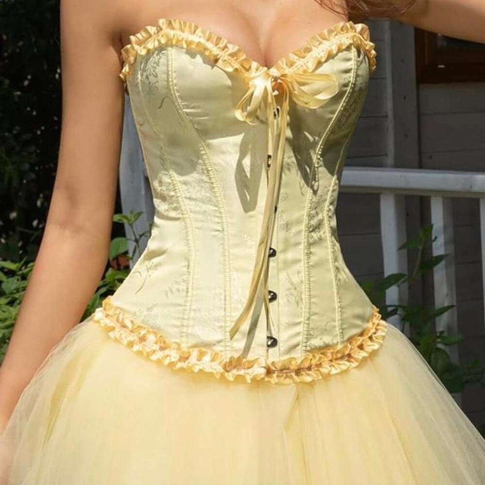 Yellow corset top with ruffles and ribbon